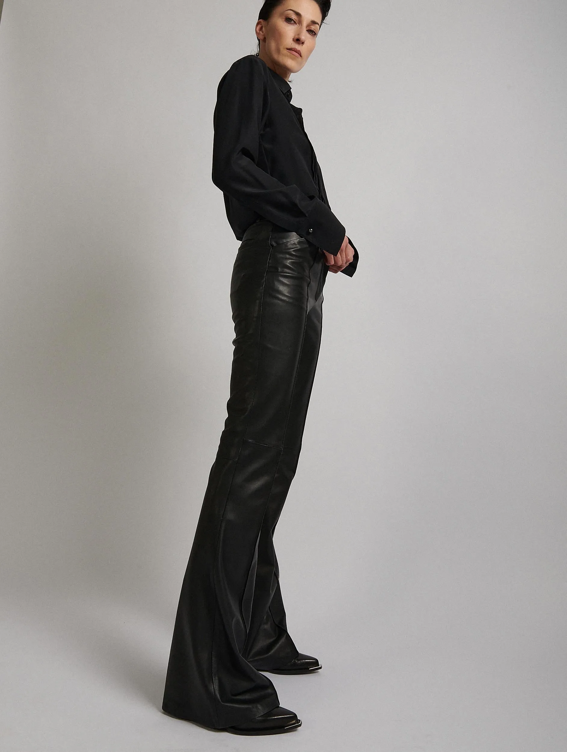 Black plongé leather bootcut trousers